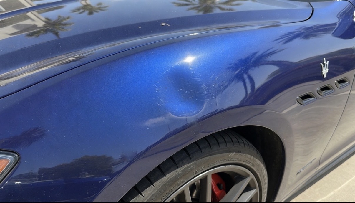 Maserati Fender Dent Repair — before