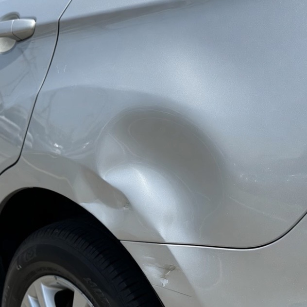 Rear Quarter Panel Dent Repair — before