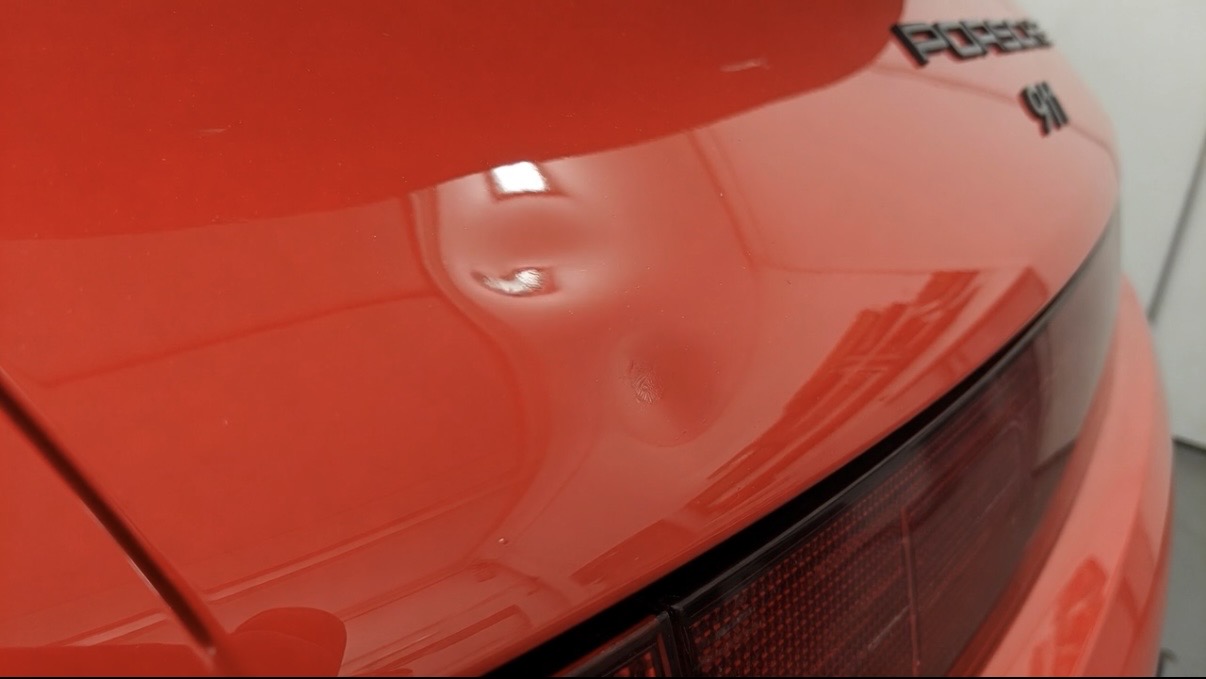 Porsche 911 Rear Dent Repair — before
